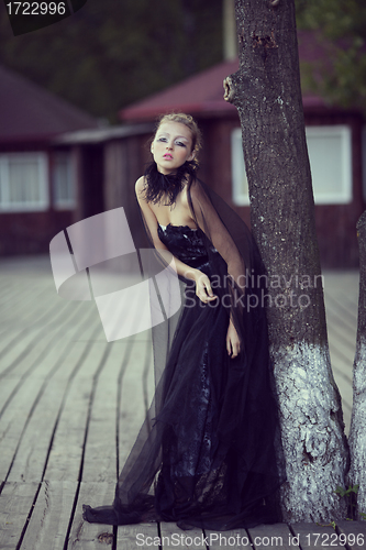 Image of beautiful girl with creative make-up mask