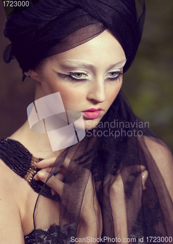 Image of beautiful girl with creative make-up mask