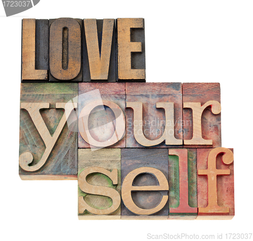 Image of love yourself in wood type