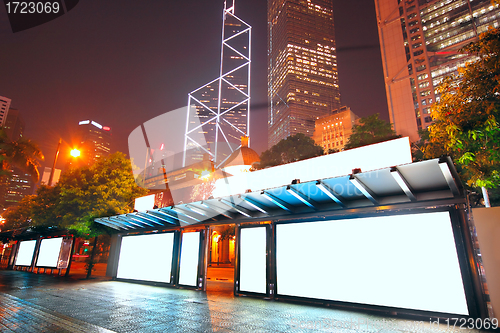 Image of Blank billboard on bus stop at night 