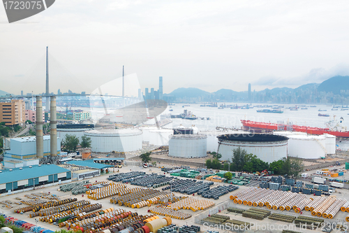 Image of power station , gas tank and cable roll