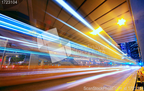 Image of Modern Urban City at Night with Freeway Traffic