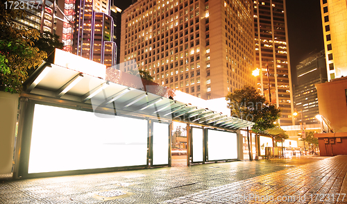 Image of Blank billboard on bus stop at night 