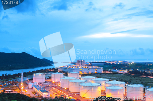 Image of oil tank at night