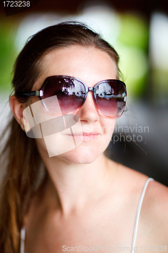 Image of Beautiful woman in sunglasses