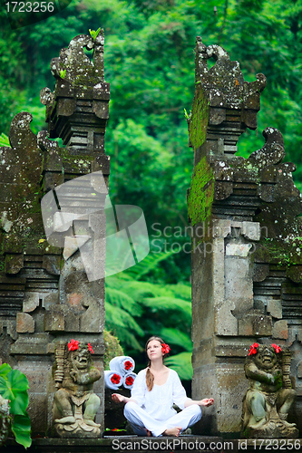 Image of Beautiful woman practicing yoga