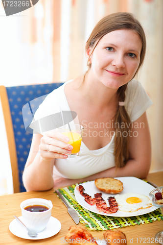 Image of Woman having breakfast