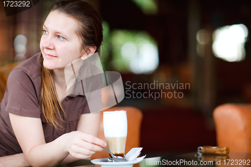 Image of Woman drinking coffee