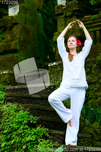 Image of Beautiful woman practicing yoga