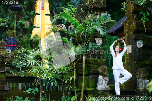 Image of Beautiful woman practicing yoga