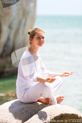 Image of Beautiful woman practicing yoga