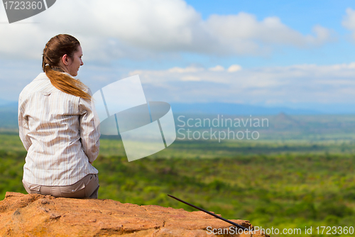 Image of Woman enjoying savanna views