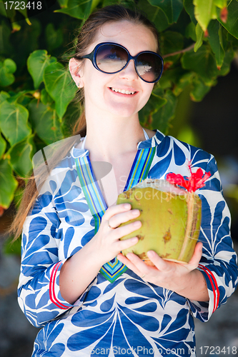 Image of Portrait of beautiful with coconut
