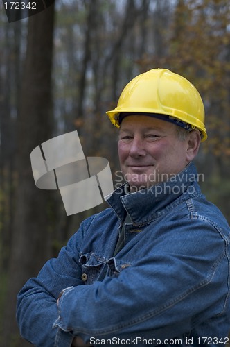 Image of smiling happy contractor