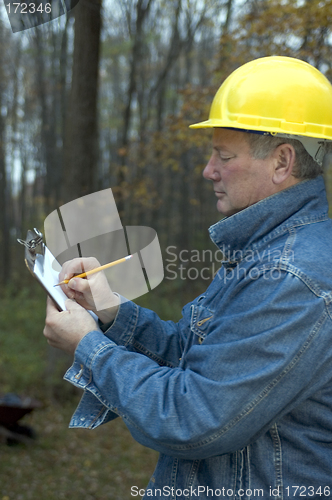 Image of smiling happy contractor