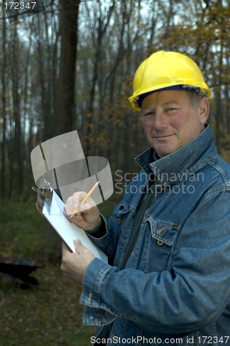 Image of smiling happy contractor