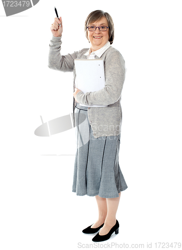 Image of Lady with her notebook and pen