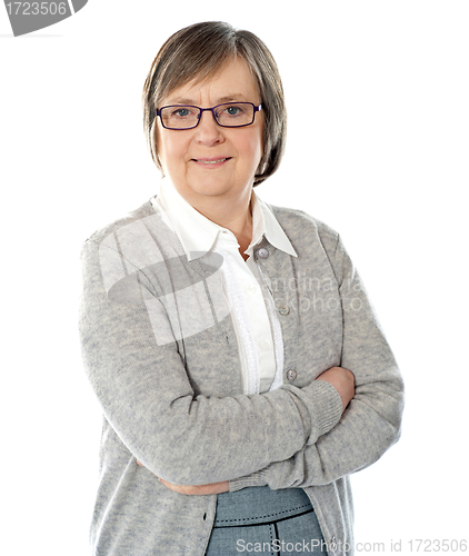 Image of Elderly corporate woman posing in style