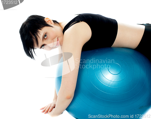 Image of Fitness exercise woman resting on pilates ball
