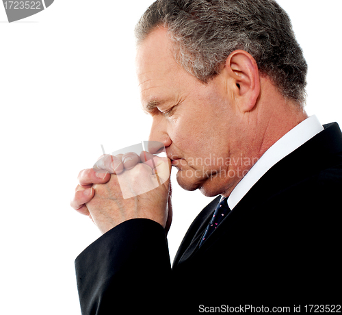 Image of Business person praying