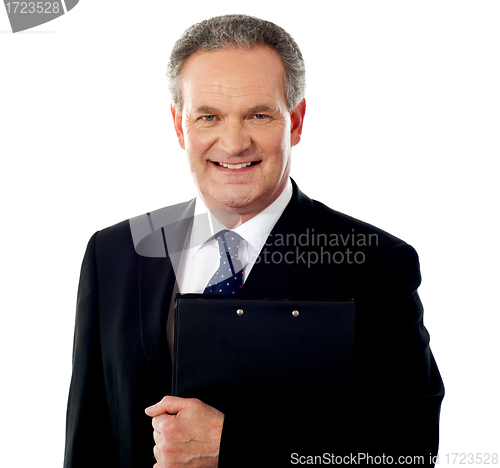 Image of Business person holding document file