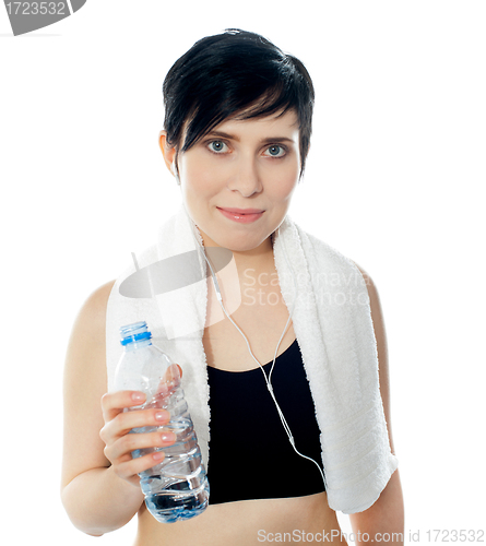 Image of Young sporty woman with towel isolated