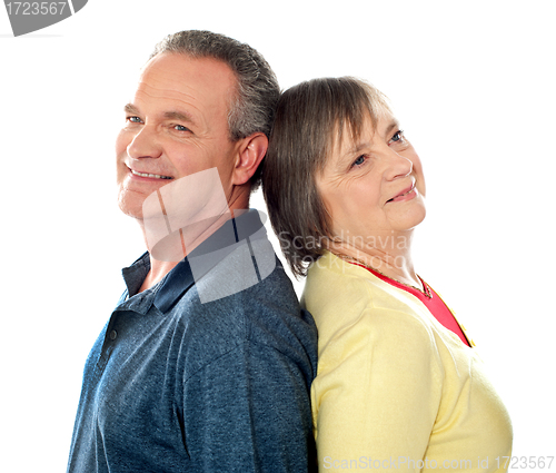 Image of Closeup shot of aged couple, back to back