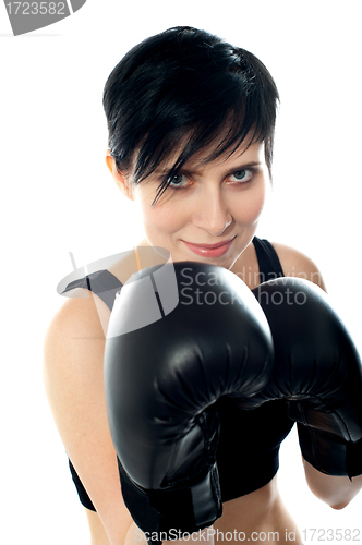 Image of Attractive caucasian girl practicing boxing