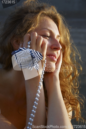 Image of Woman with beads