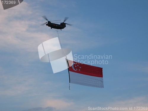 Image of Copter Flying Singapore Flag