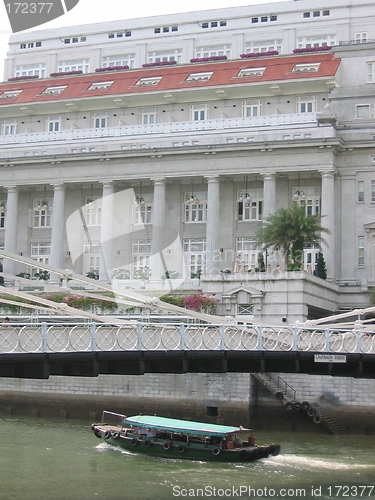 Image of Cavenagh Bridge Next To Fullerton Hotel In Singapore