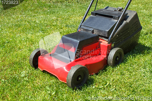 Image of Lawnmower on grass