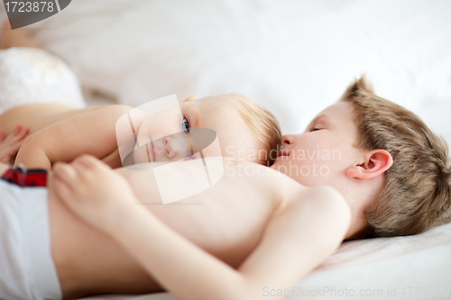 Image of Kids playing in bed