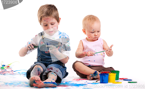 Image of Boy and girl painting