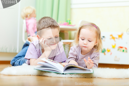 Image of Brother and sister reading