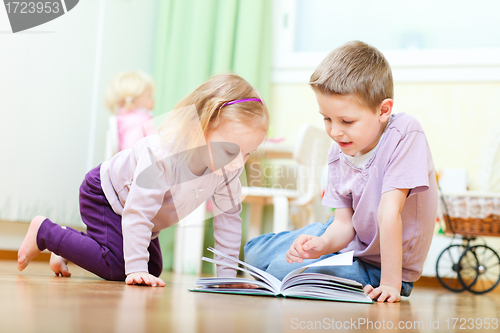 Image of Brother and sister reading