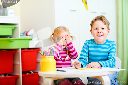 Image of Two kids at their room