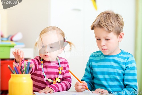 Image of Brother and sister drawing