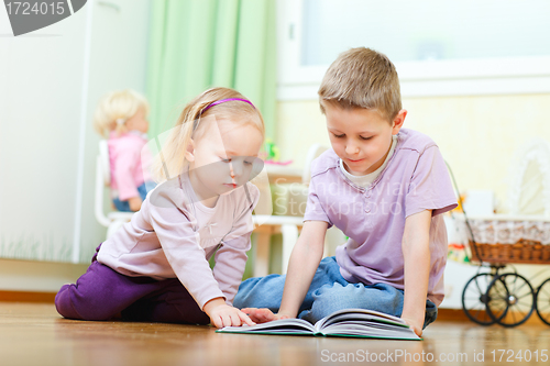 Image of Brother and sister reading