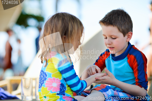 Image of Two kids playing together 