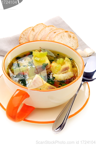 Image of Fish soup in a bowl on a white background.