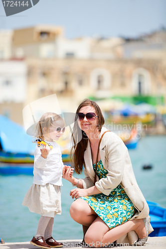 Image of Mother and daughter portrait outdoors