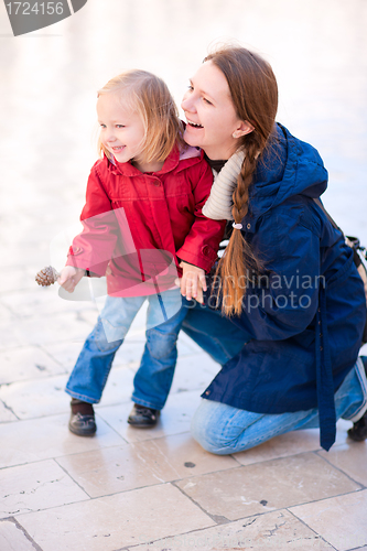 Image of Mother and daughter portrait outdoors