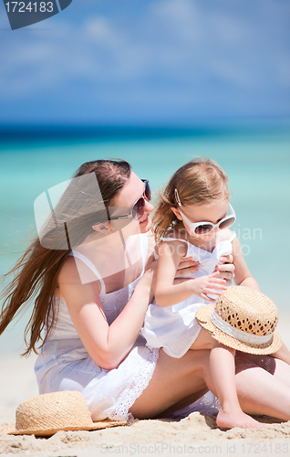Image of Mother and daughter at beach