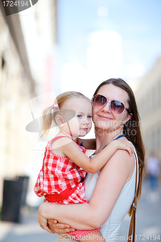 Image of Mother and daughter portrait outdoors