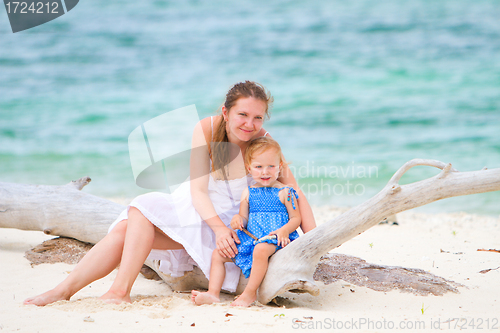 Image of Mother and her daughter on tropical beach