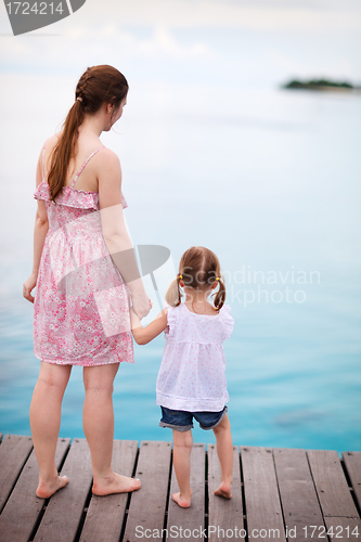 Image of Mother and daughter enjoying sea views