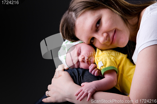 Image of Happy young mother and newborn girl