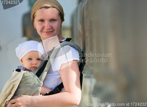 Image of Mother and baby traveling