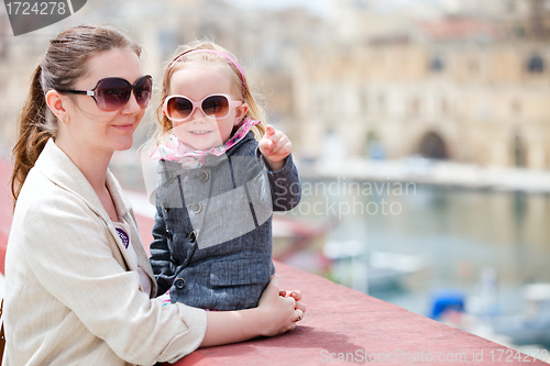 Image of Mother and daughter portrait outdoors